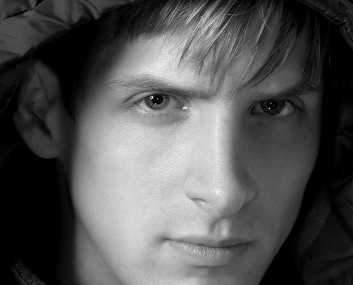 Leatherhead male model with hood by Photographer Ray Ball