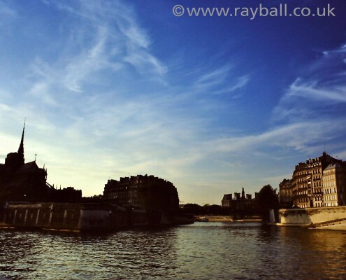 Blue sky, river and cathedral
