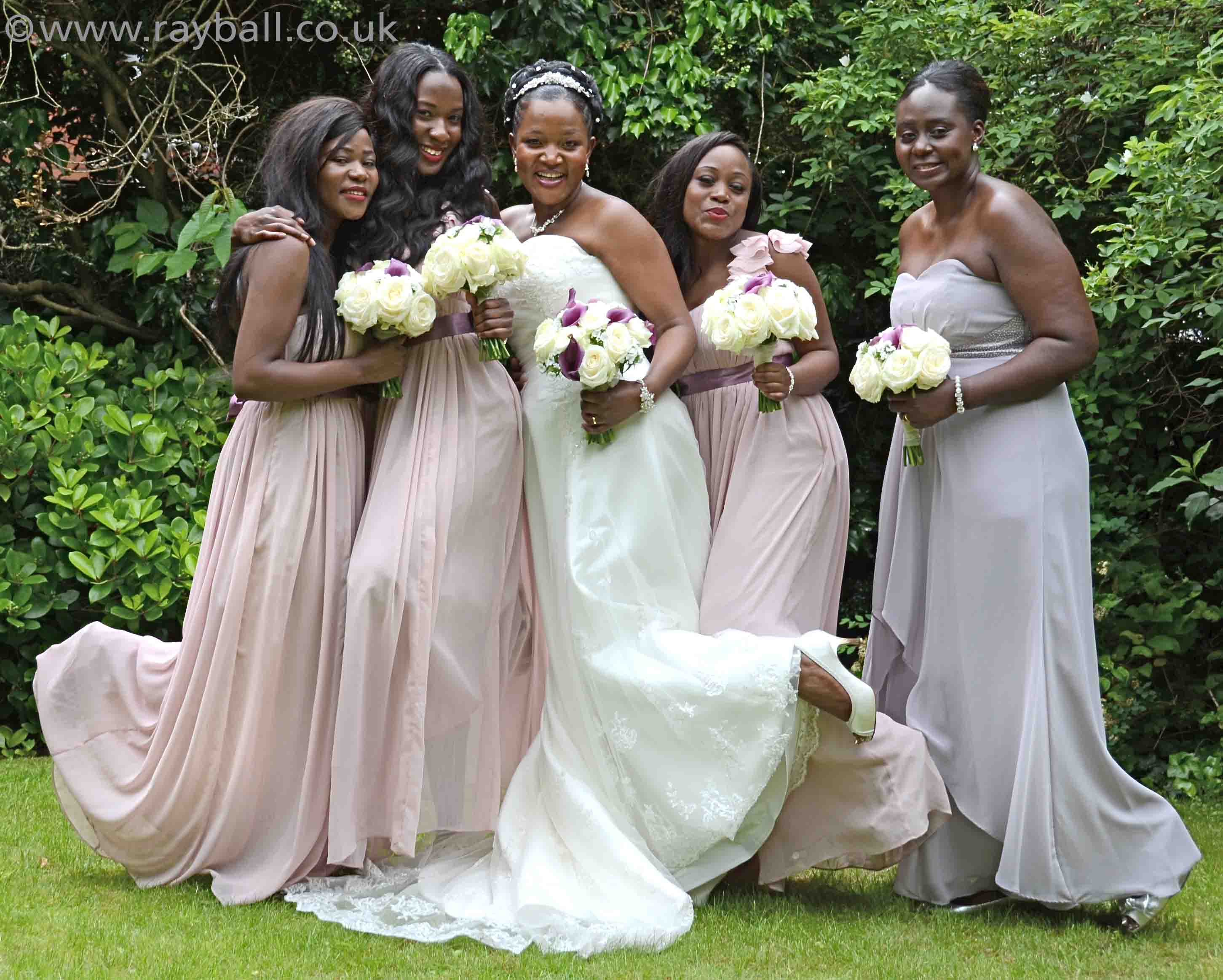 Worcester Park bride with bridesmaids at Sutton Registry Office garden