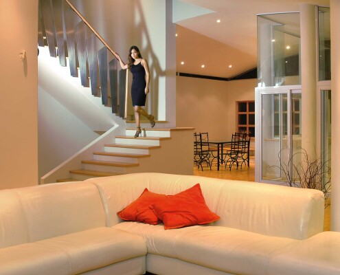 Worcester Park model on stairs in Sutton home by Epsom Photography Surrey.