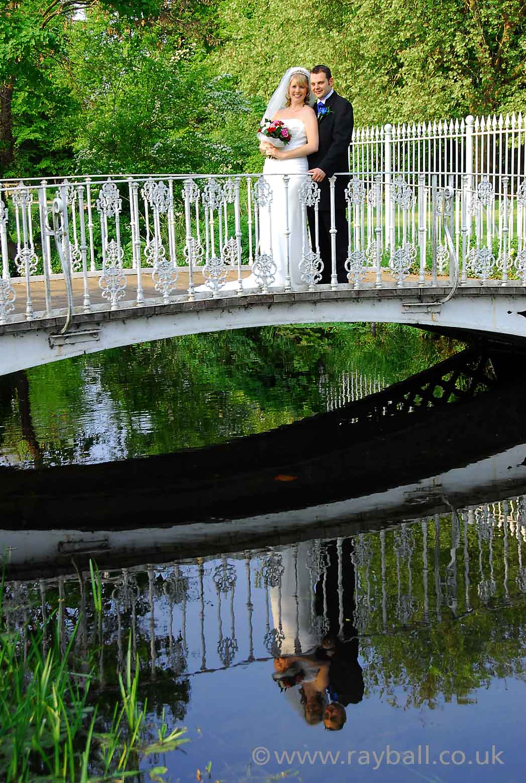 Tolworth bride and groom over river near Sutton.