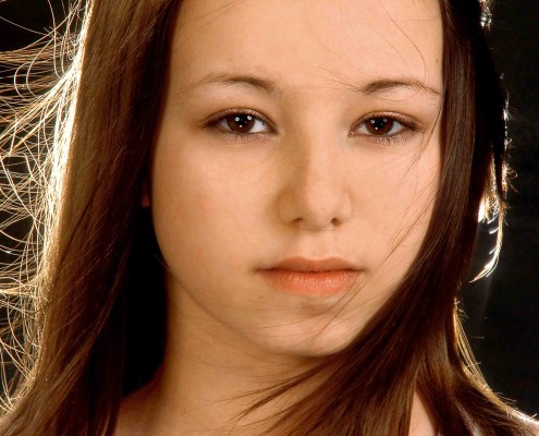 Photo of Sutton girl with smouldering brown eyes.